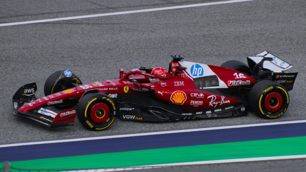 Ferrari Formula 1 car of Charles Leclerc racing on track during the 2025 season, illustrative image