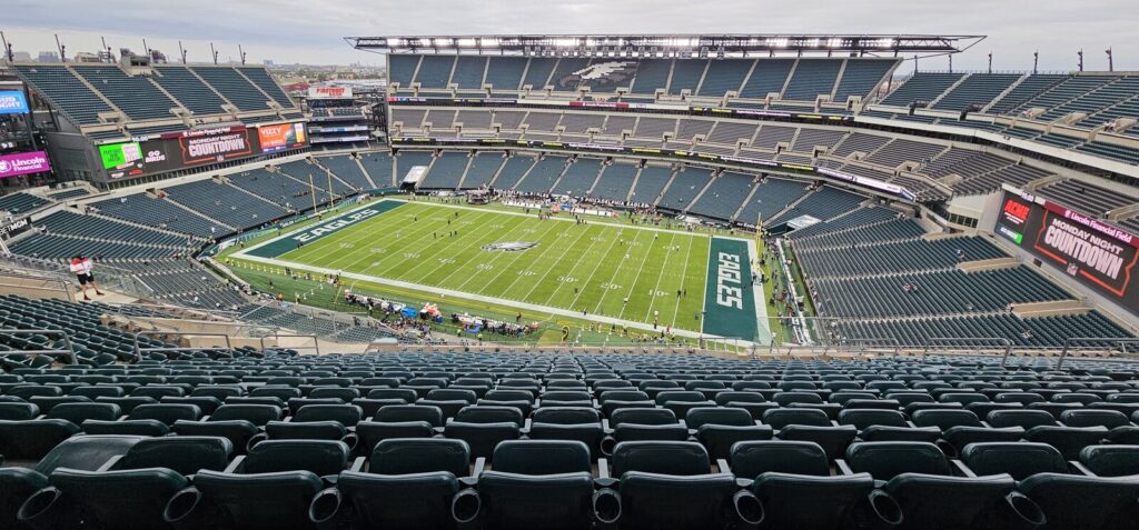 Wide interior view of Lincoln Financial Field, home stadium of the Philadelphia Eagles, filled with fans before a game.
