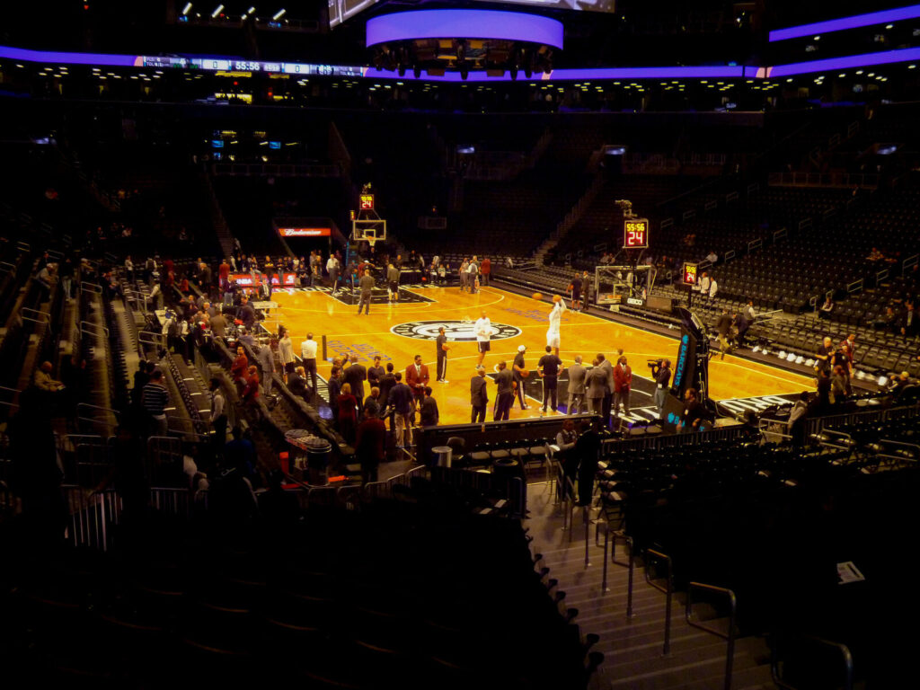 Brooklyn Nets players warming up on the court before a game