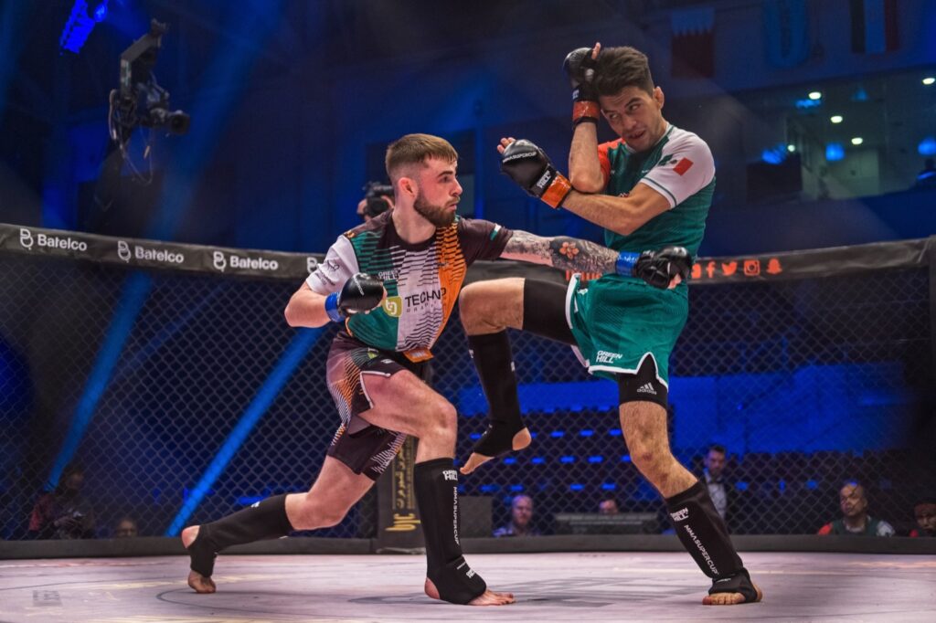 Mixed martial arts fighters in the cage
