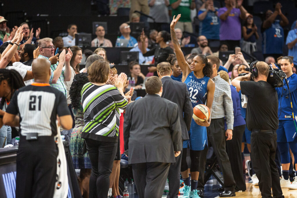 Minnesota Lynx forward Rebekkah Brunson waves to the crowd at Target Center during a 2018 regular-season game.
