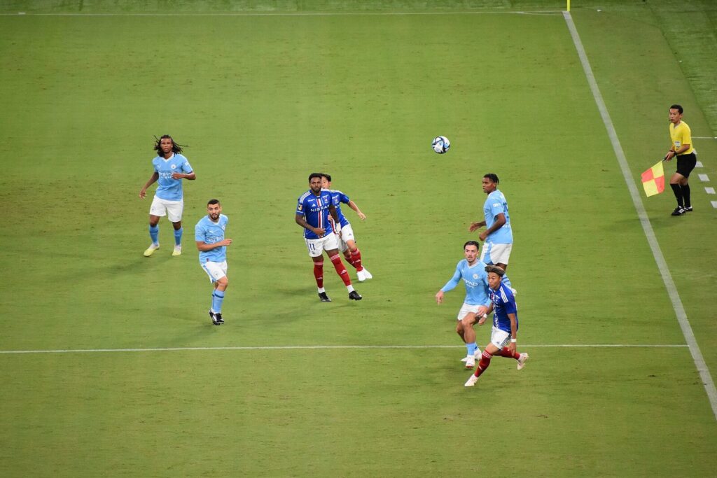 Manchester City players in sky-blue kits in open play during a preseason friendly, file photo