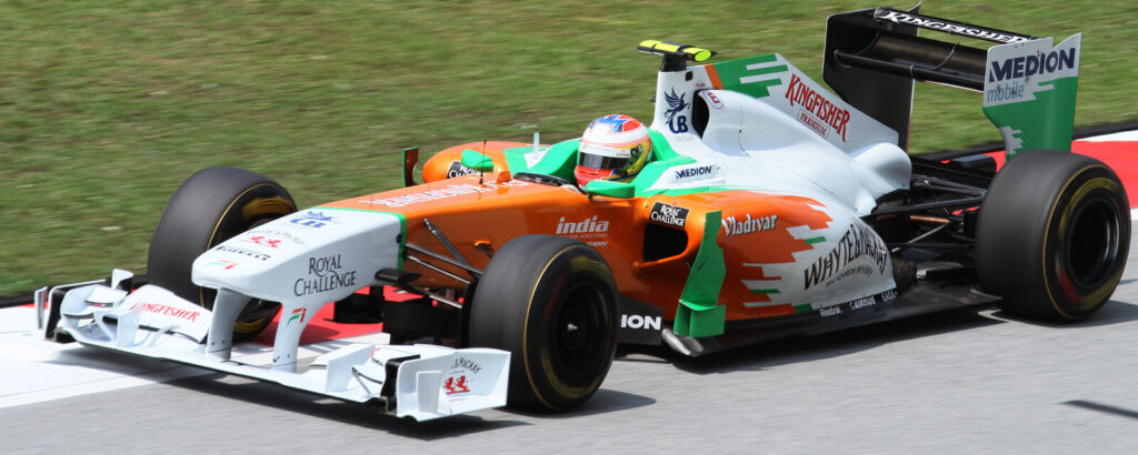 Force India F1 car with its rear wing DRS flap open during a 2011 Malaysian Grand Prix practice session