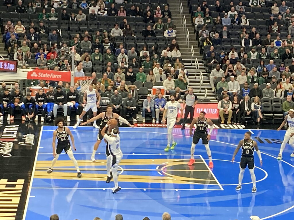 NBA in-game action between the Orlando Magic and Milwaukee Bucks, players competing on the court